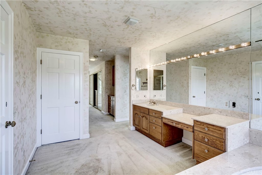 1632 Smiley Heights Drive Redlands, CA 92373 - Photo 37 of 75 a large bathroom with a large tub and sink
