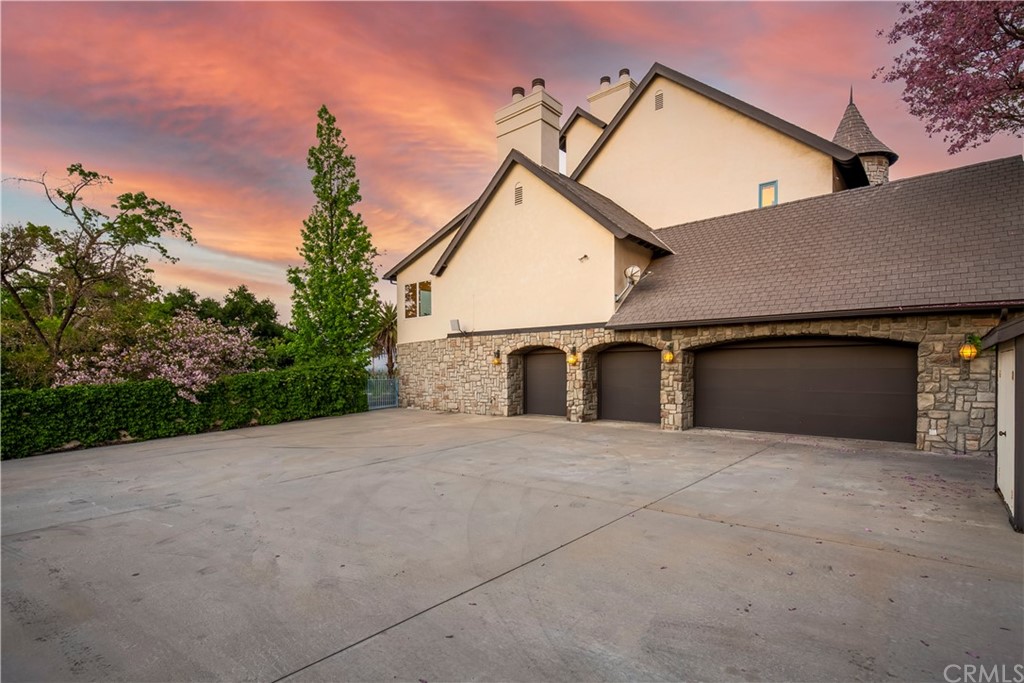 1632 Smiley Heights Drive Redlands, CA 92373 - Photo 55 of 75 a front view of a house with yard and garage
