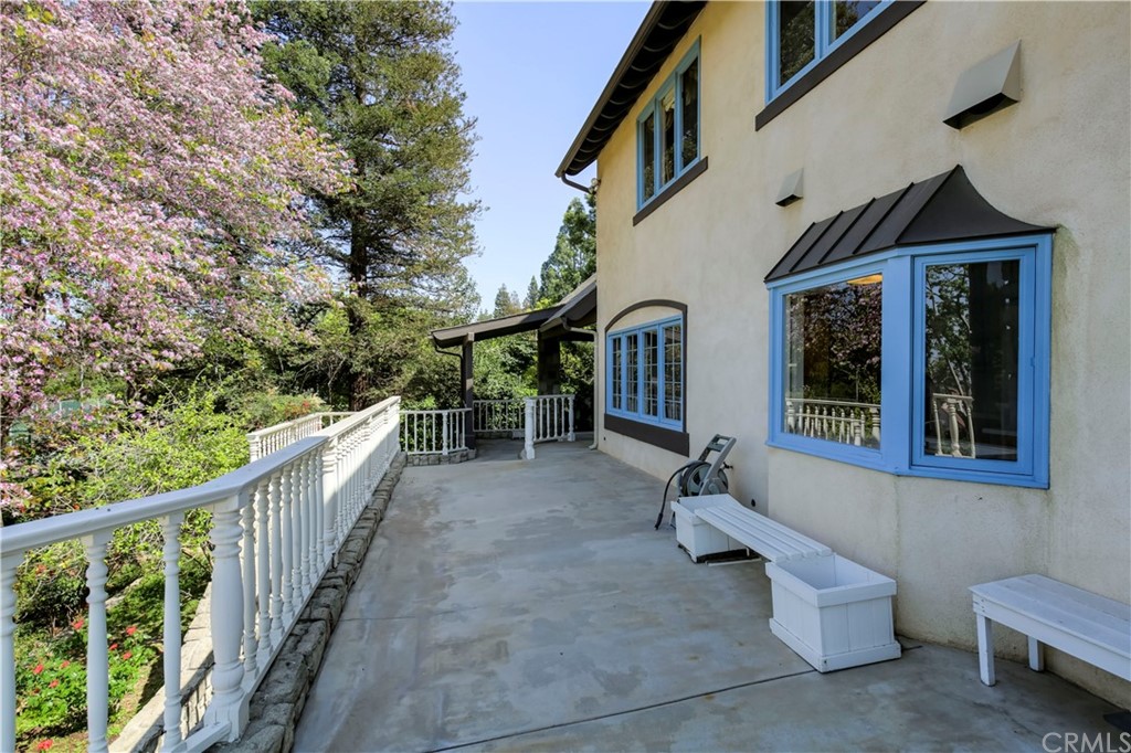 1632 Smiley Heights Drive Redlands, CA 92373 - Photo 57 of 75 a view of a patio with a table and chairs