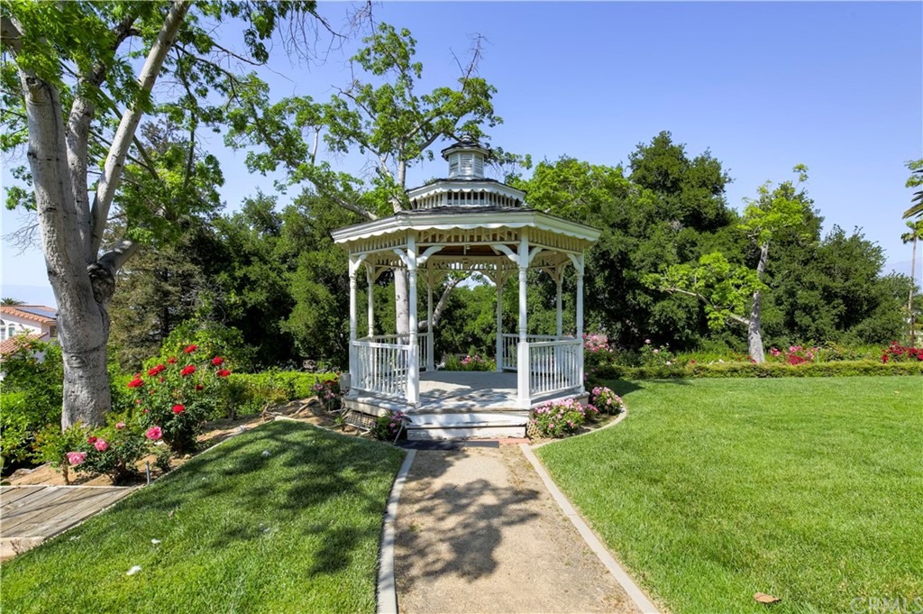 1632 Smiley Heights Drive Redlands, CA 92373 - Photo 65 of 75 a view of a house with backyard sitting area and garden