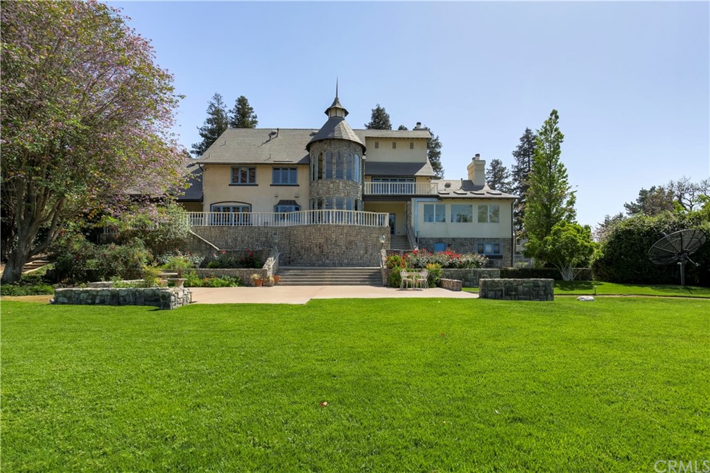 1632 Smiley Heights Drive Redlands, CA 92373 - Photo 69 of 75 a front view of a house with a garden and sitting area