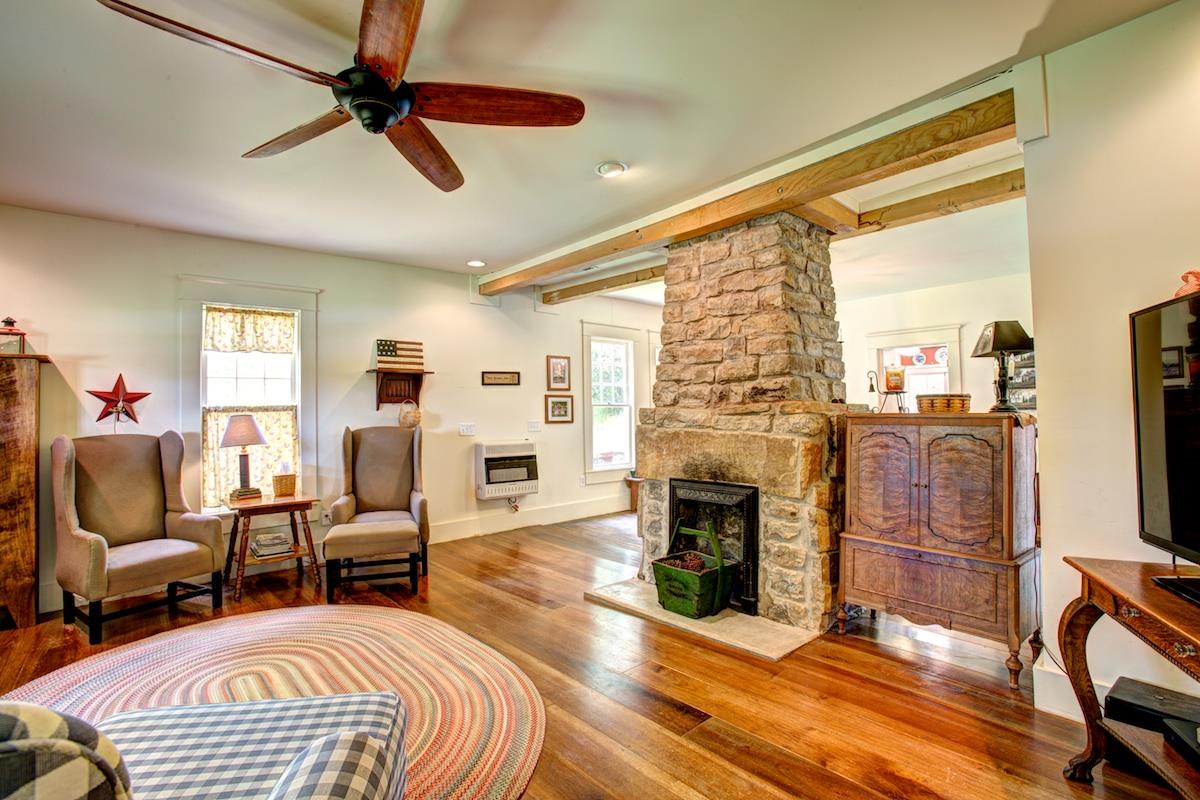 1836 Pisgah Ridge Road Pulaski, TN 38478 - Photo 6 of 30 a living room with furniture fireplace and flat screen tv