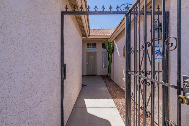 a view of a house with a door and a window