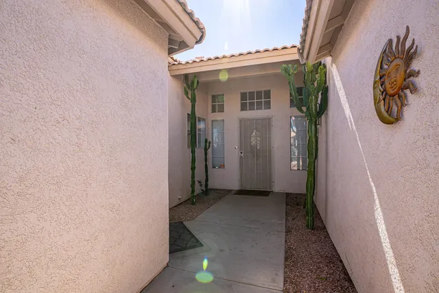 a backyard of a house with yard fire pit and outdoor seating