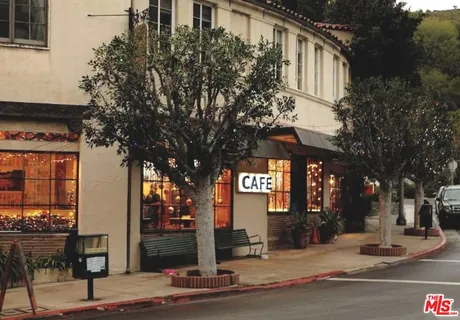 a sign that is on the side of a street