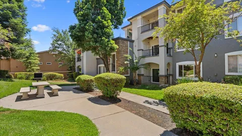 a view of a patio in front of house