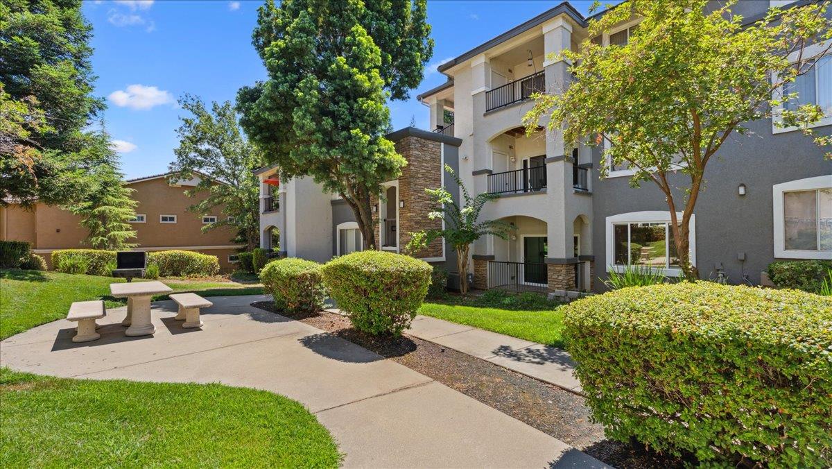 a view of a patio in front of house