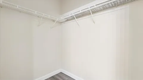 a view of a room with racks on the wall