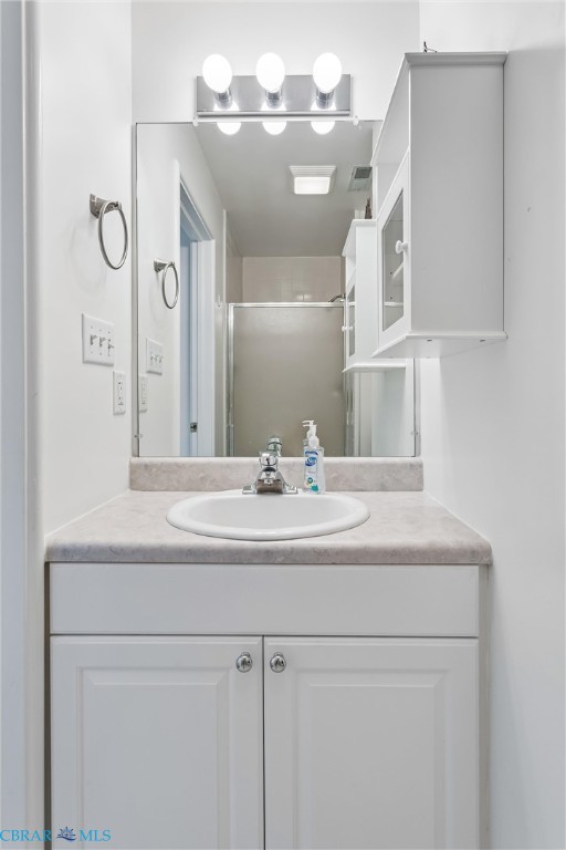 172 Sturgeon Creek Road Deltaville, VA 23043 - Photo 24 of 50 Full bath featuring vanity and a stall shower