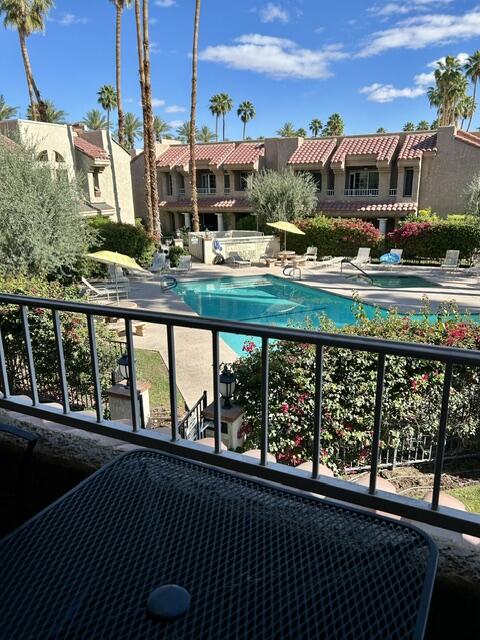 2700 Lawrence Crossley Road, Unit 18 Palm Springs, CA 92264 - Photo 1 of 7 a view of a city from a balcony