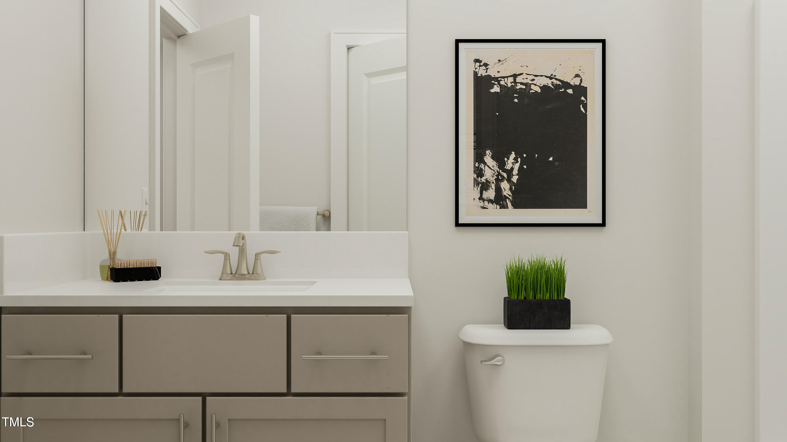 105 Corapeake Way Apex, NC 27539 - Photo 5 of 22 a bathroom with a sink and a mirror
