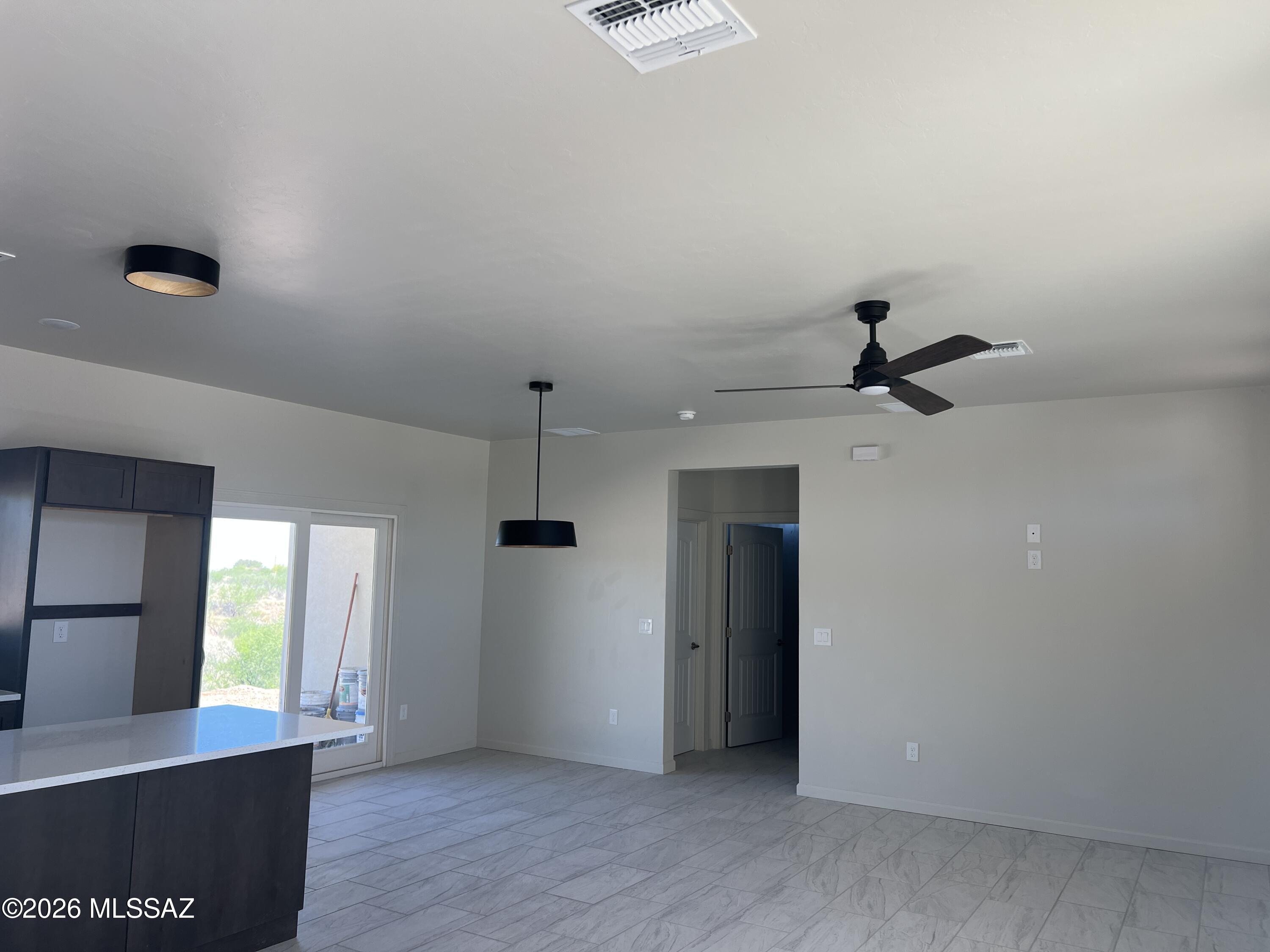 1501 Circulo Sombrero Rio Rico, AZ 85648 - Photo 8 of 26 a view of an empty room with a window