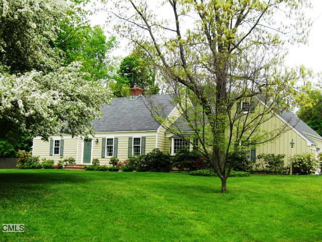 19 Old Musket Lane Ridgefield, CT 06877 - Photo 1 of 1 a view of a house next to a big yard and large trees