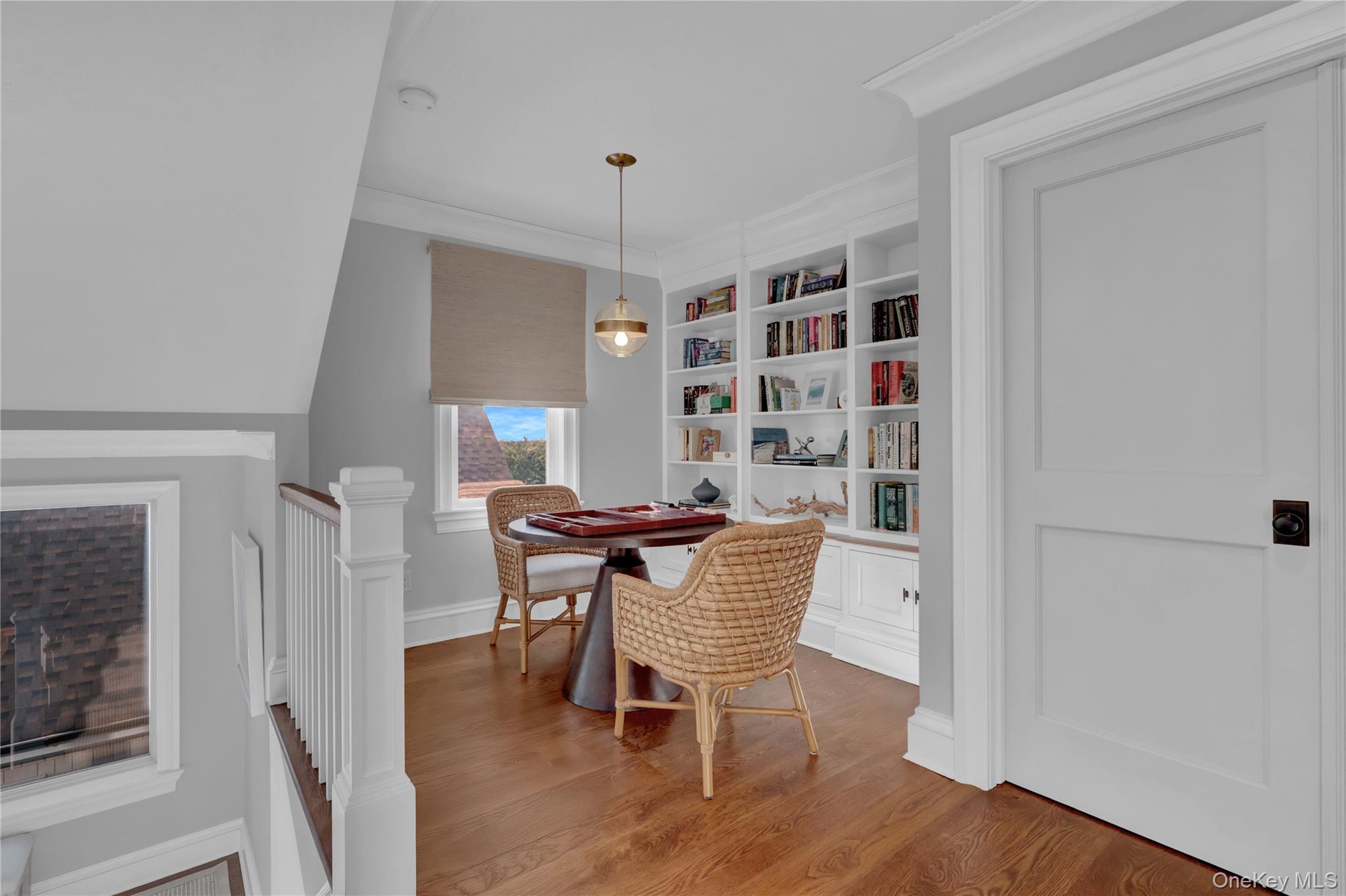 99 Parkside Drive Point Lookout, NY 11569 - Photo 24 of 50 a dining room with furniture and wooden floor