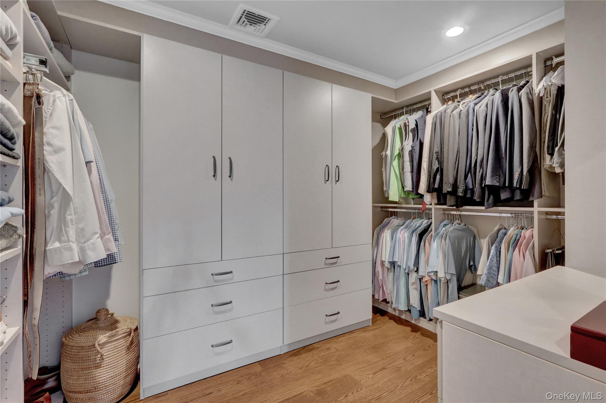 99 Parkside Drive Point Lookout, NY 11569 - Photo 32 of 50 a view of walk in closet with clothes and shoes