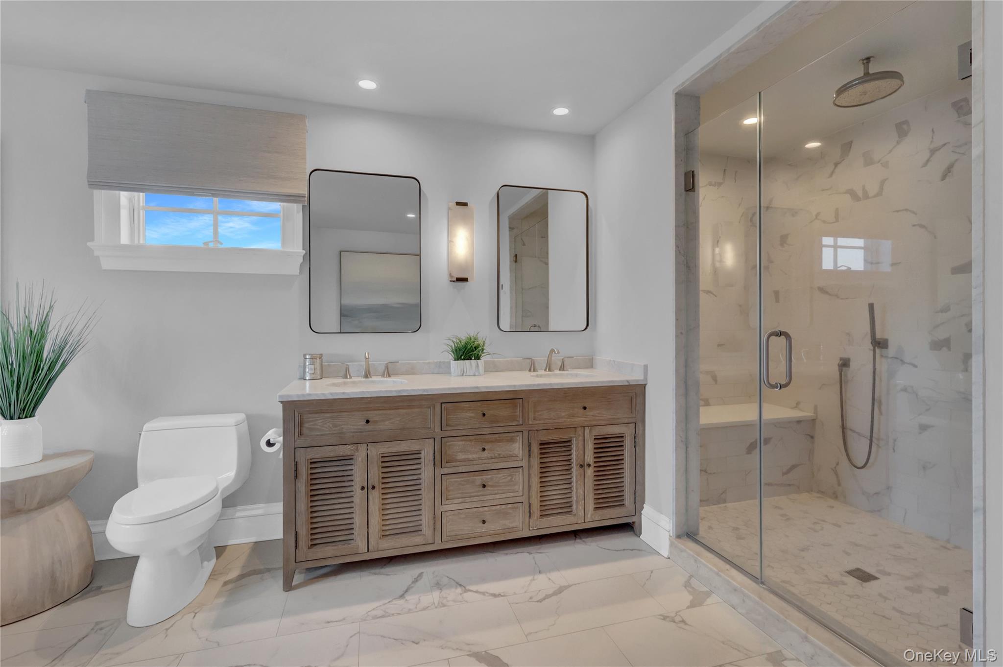 99 Parkside Drive Point Lookout, NY 11569 - Photo 34 of 50 a bathroom with a double vanity sink toilet and shower