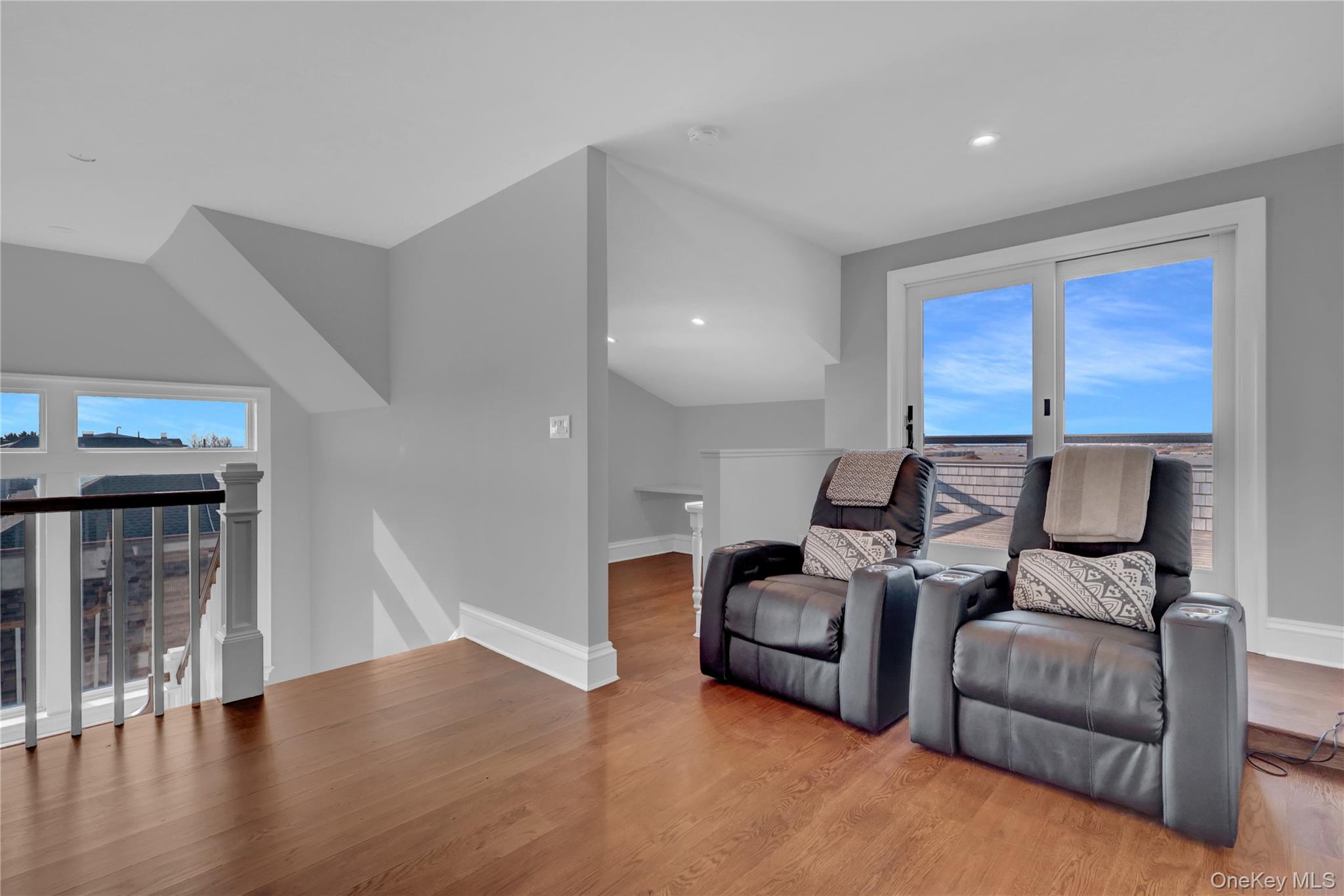 99 Parkside Drive Point Lookout, NY 11569 - Photo 37 of 50 a living room with furniture and a window