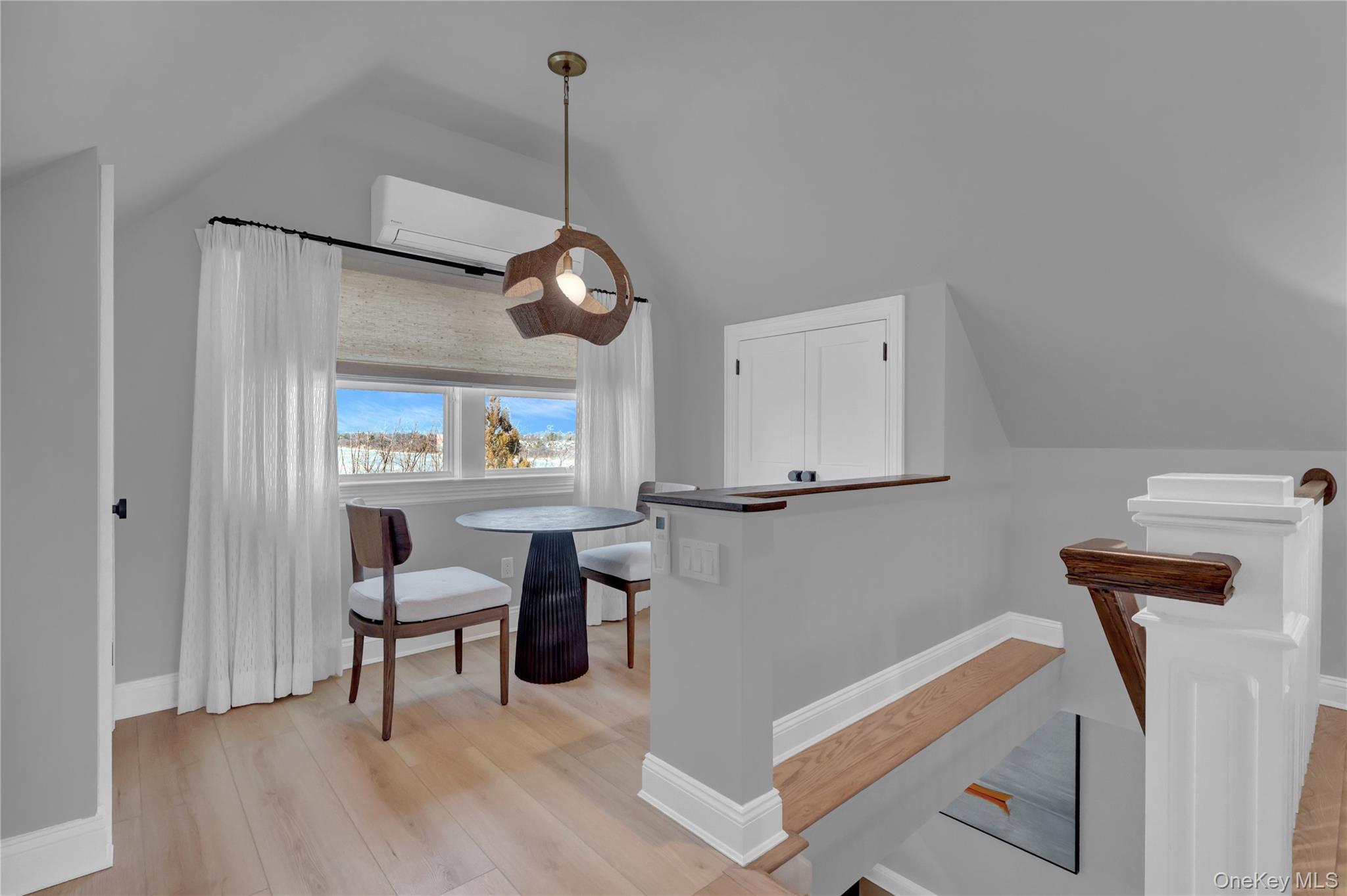 99 Parkside Drive Point Lookout, NY 11569 - Photo 48 of 50 a view of a room with furniture and wooden floor