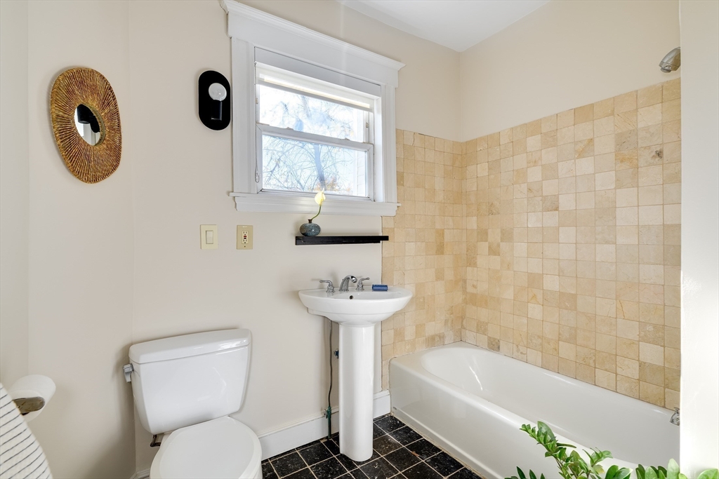 161 Columbia Street, Unit 3 Cambridge, MA 02139 - Photo 16 of 19 a bathroom with a sink a toilet and shower