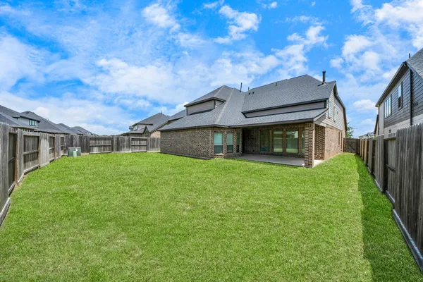 a house view with a outdoor space
