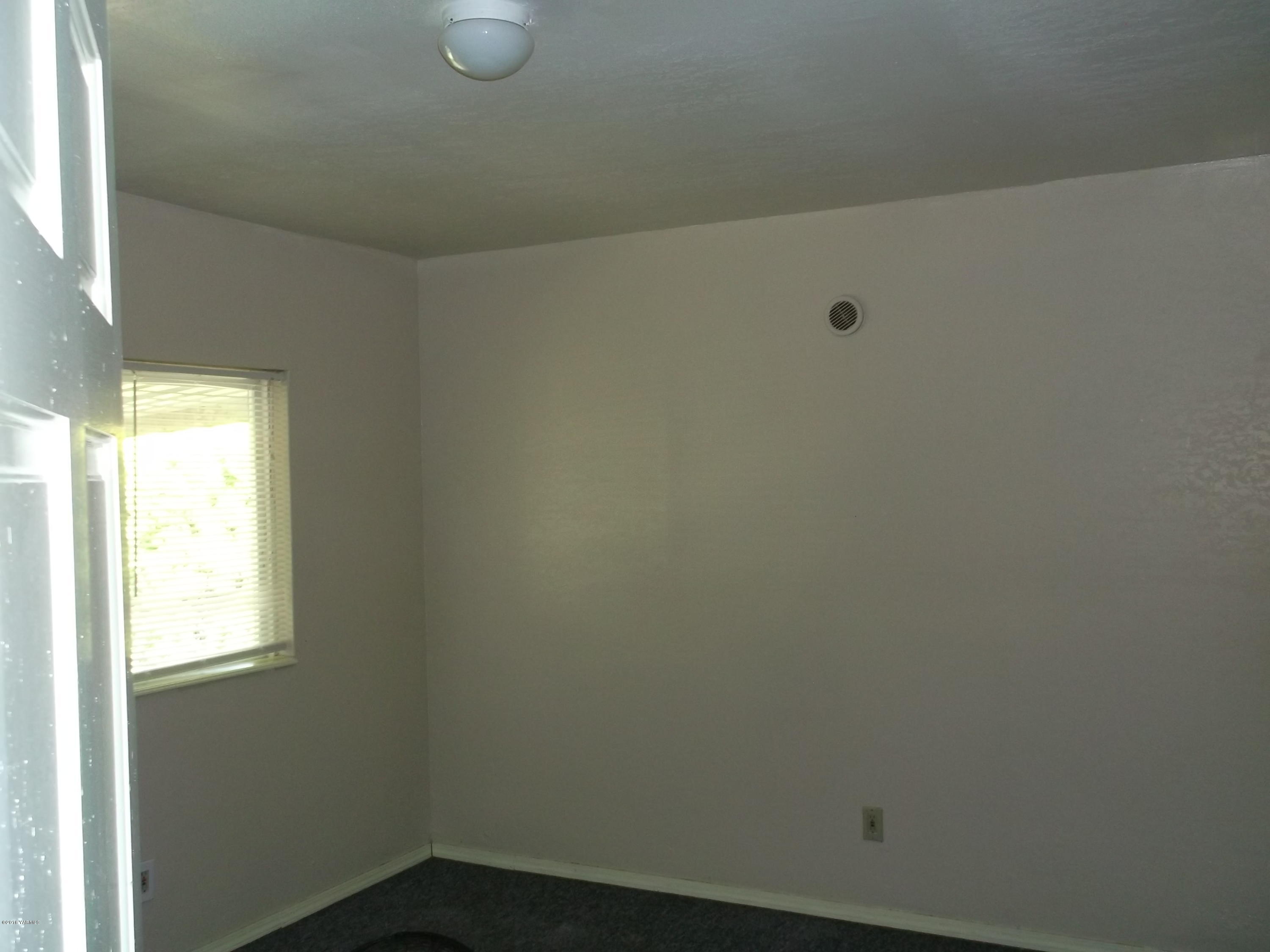 419 Cemetery Road Sunnyside, WA 98944 - Photo 9 of 15 a small space with a window