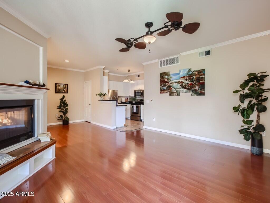 a view of a living room a fireplace with wooden floor