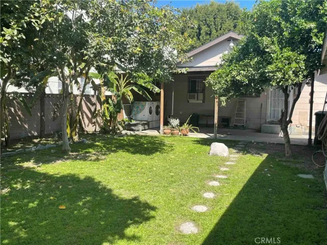 a view of a house with swimming pool