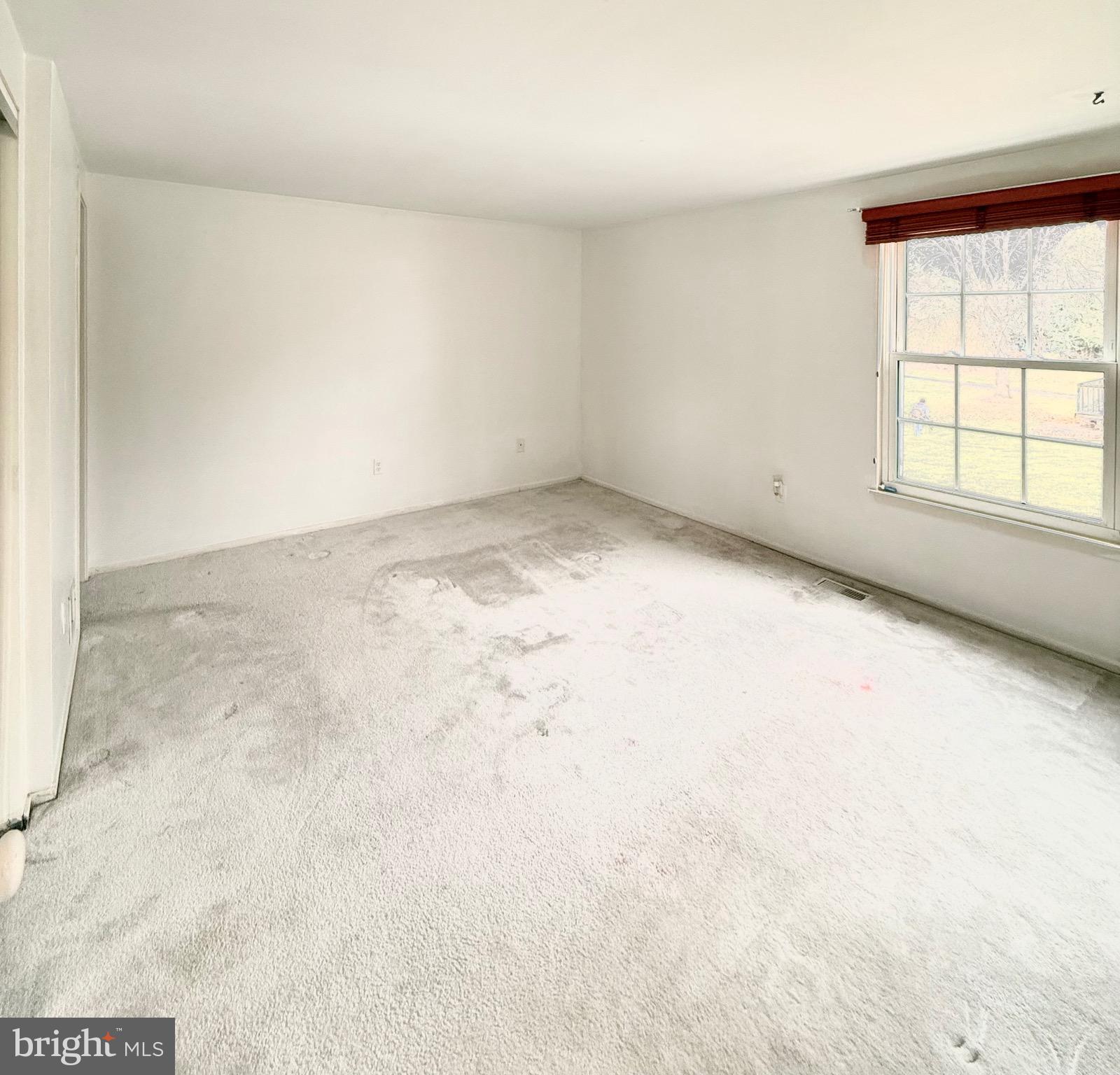 6915 Bugledrum Way Columbia, MD 21045 - Photo 13 of 25 an empty room with a window