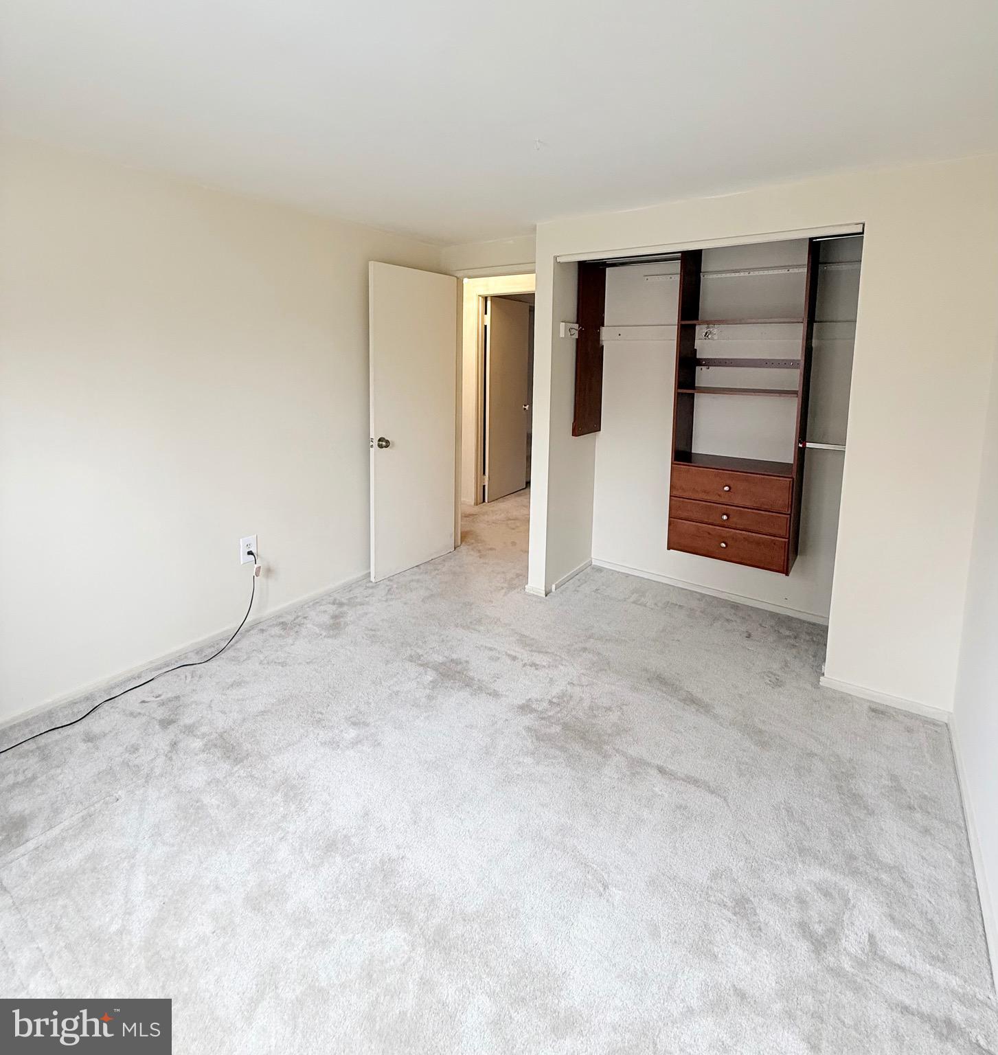 6915 Bugledrum Way Columbia, MD 21045 - Photo 17 of 25 a view of an empty room with a closet
