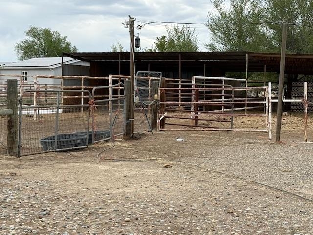 851 21 Road Fruita, CO 81521 - Photo 9 of 17 a view of an empty room with wooden floor