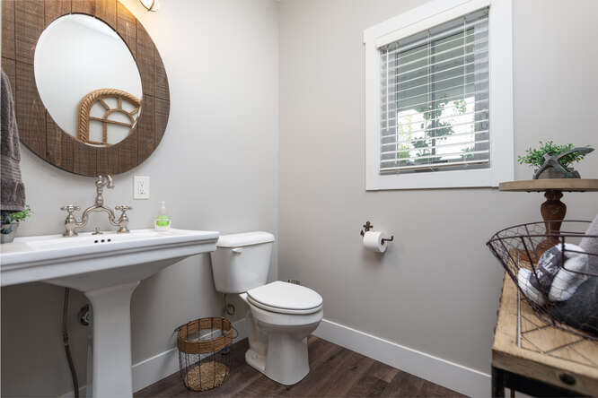 17 Windward Way Ottawa, IL 61350 - Photo 11 of 48 a bathroom with a toilet a sink and a mirror