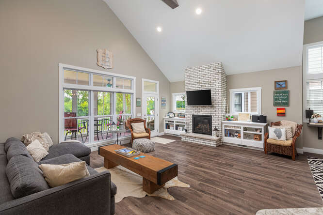 17 Windward Way Ottawa, IL 61350 - Photo 17 of 48 a living room with furniture a fireplace and a flat screen tv