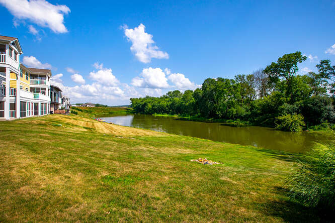17 Windward Way Ottawa, IL 61350 - Photo 9 of 48 a view of a lake with a house in the background