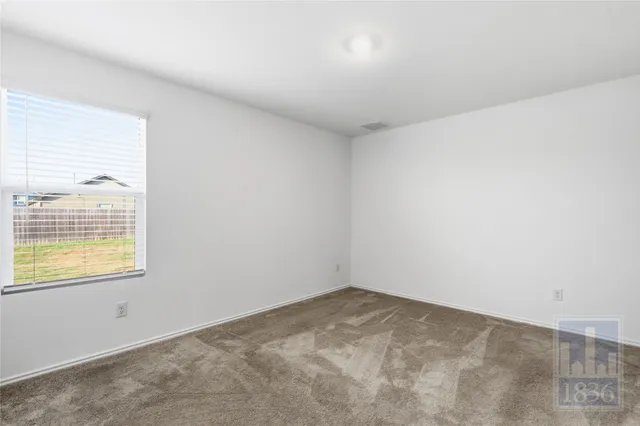 an empty room with a window