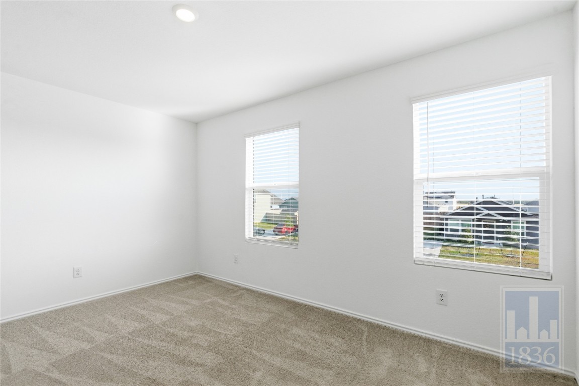2213 Cyclone Drive Lockhart, TX 78644 - Photo 20 of 26 an empty room with a window