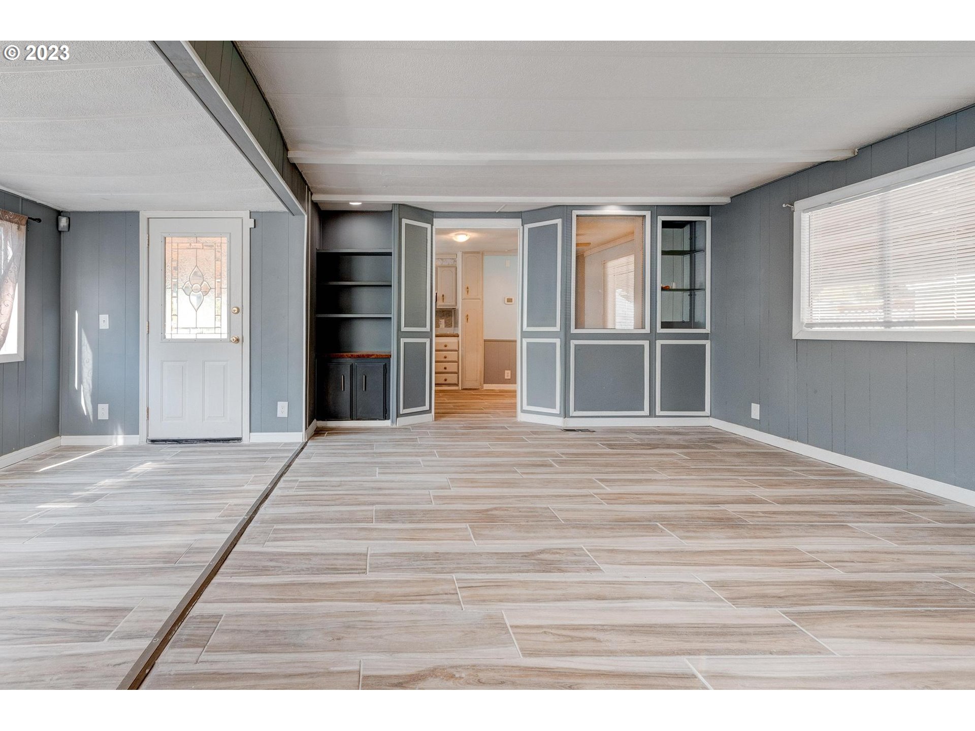 5600 Mt Solo Road, Unit 83 Longview, WA 98632 - Photo 4 of 27 a view of empty room with wooden floor and window