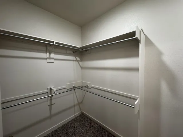 a view of a room with racks on the wall