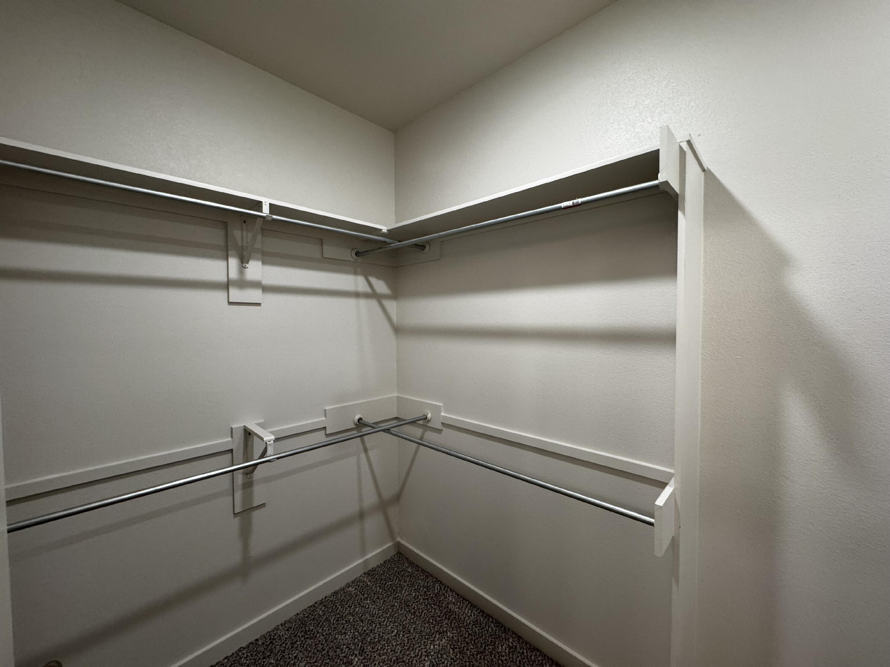 2613 135th Street Lubbock, TX 79423 - Photo 14 of 15 a view of a room with racks on the wall