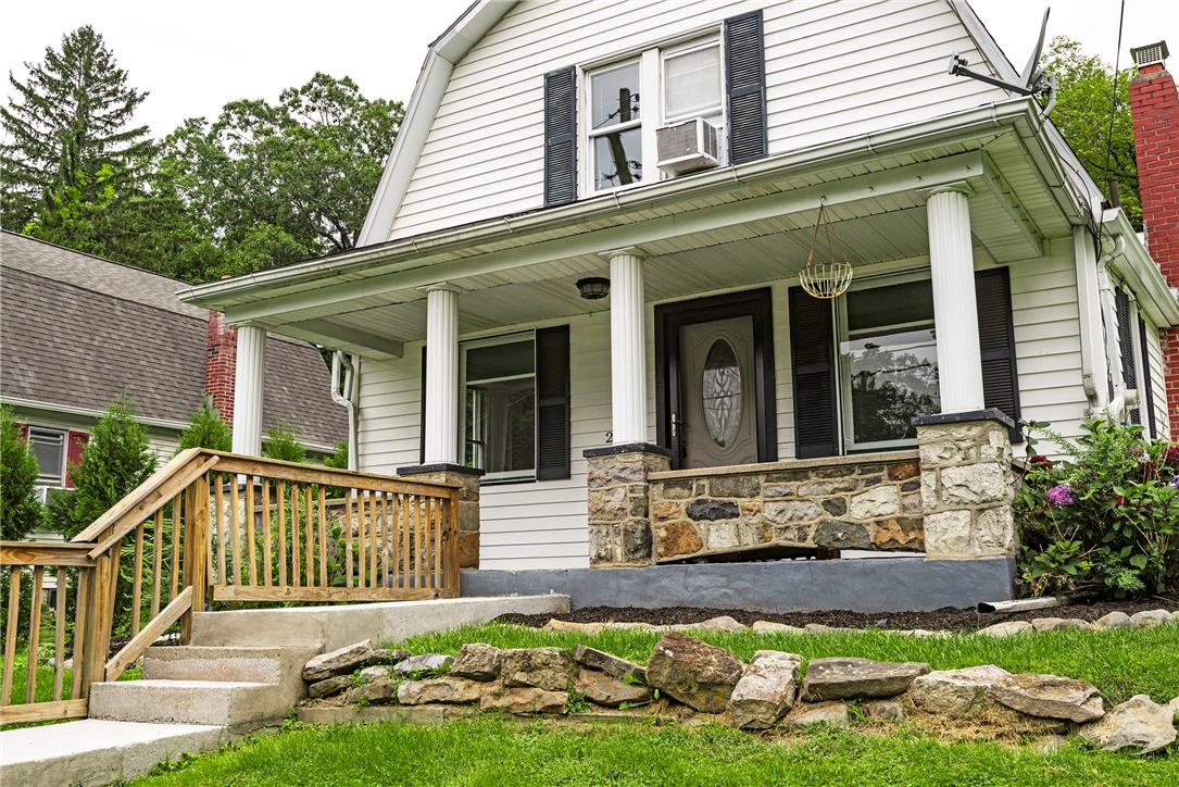 280 Oak Road Bangor, PA 18013 - Photo 36 of 52 Classical columns and rustic stone details anchor the welcoming front porch.