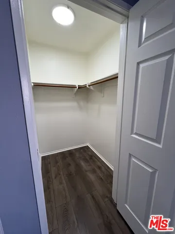 a view of an empty walk in closet