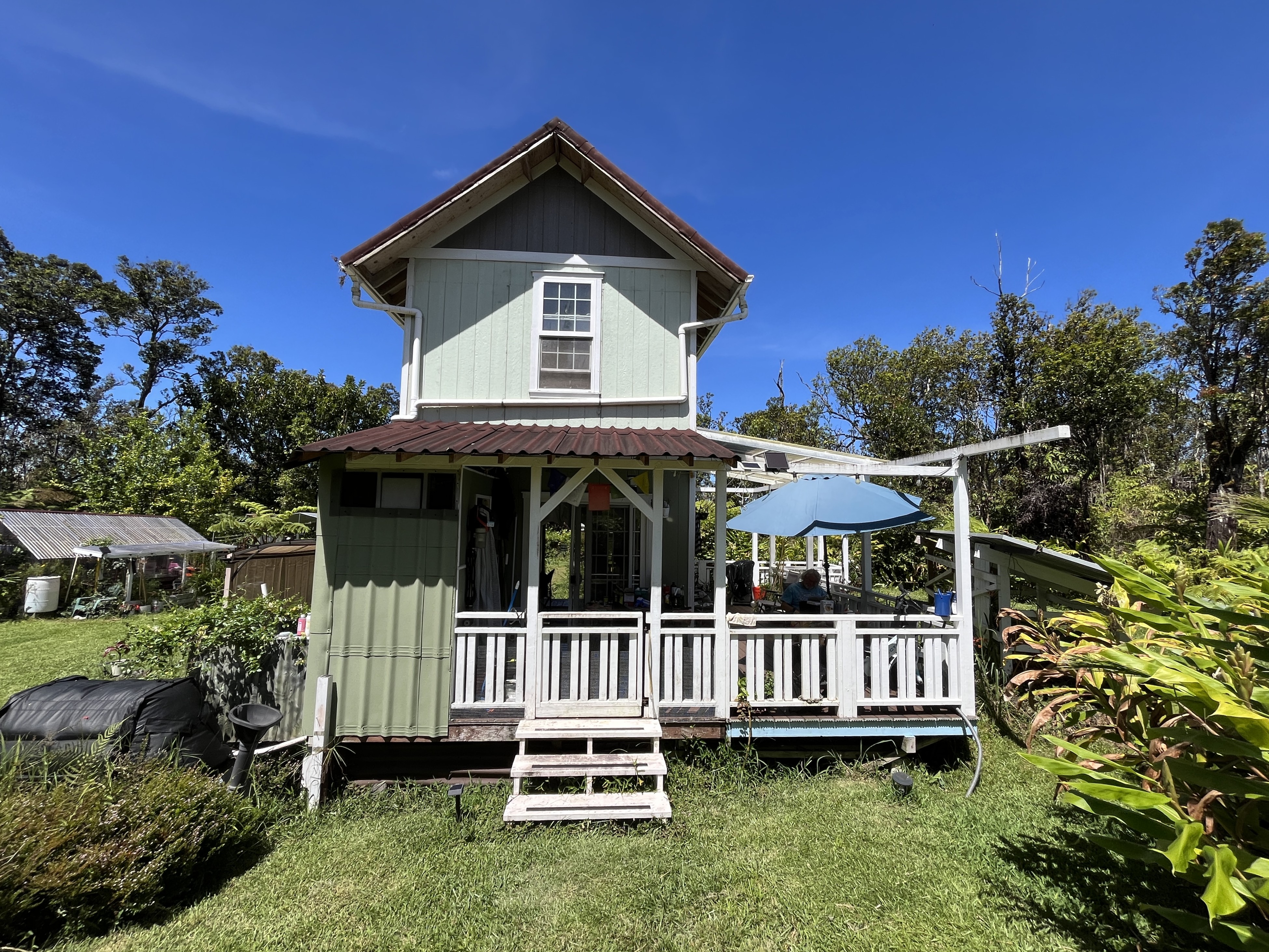 11-2729 Uakoko Road Mountain View, HI 96771 - Photo 12 of 26 a view of a small yard with wooden fence