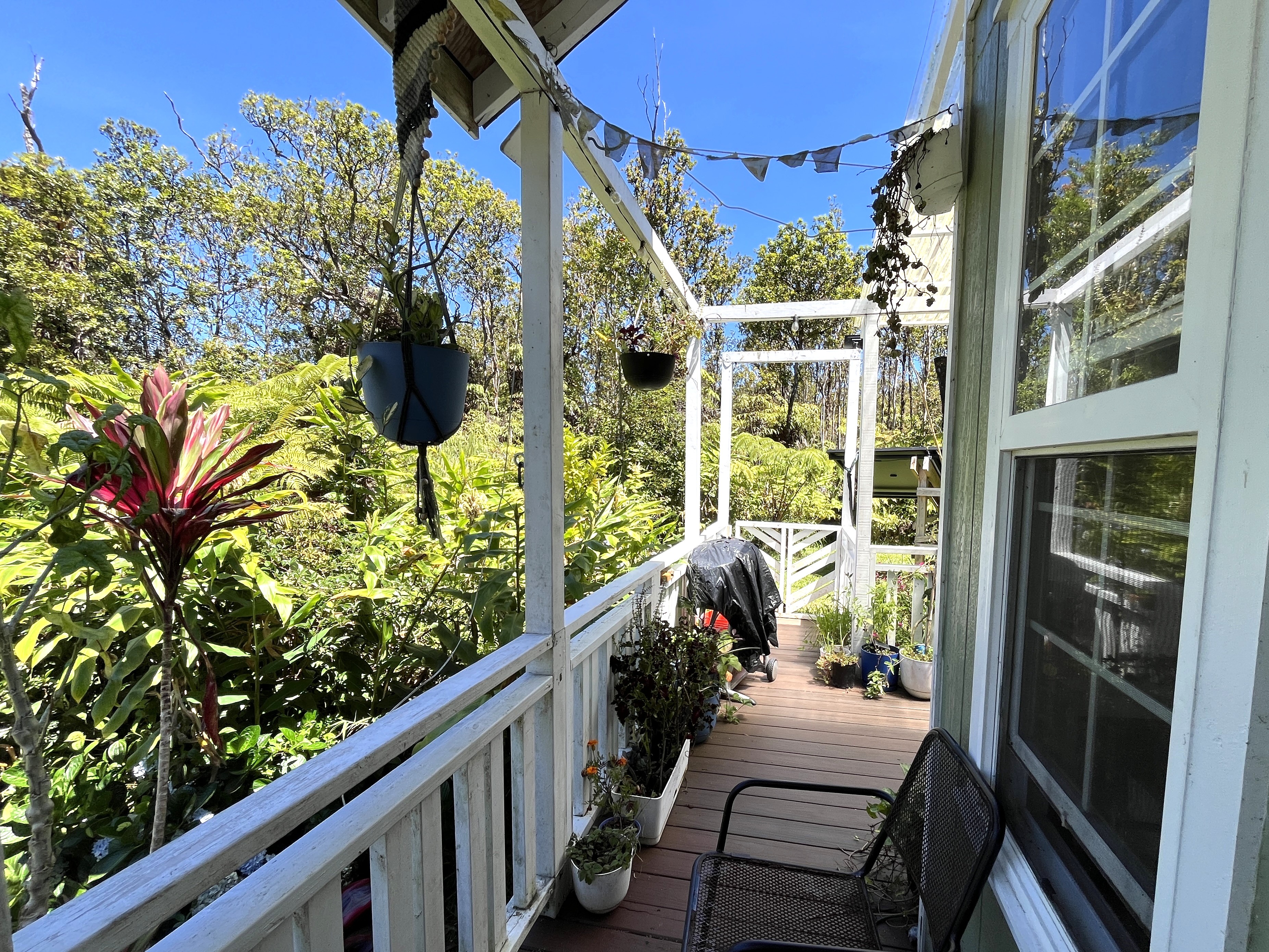 11-2729 Uakoko Road Mountain View, HI 96771 - Photo 2 of 26 a view of balcony with a potted plant
