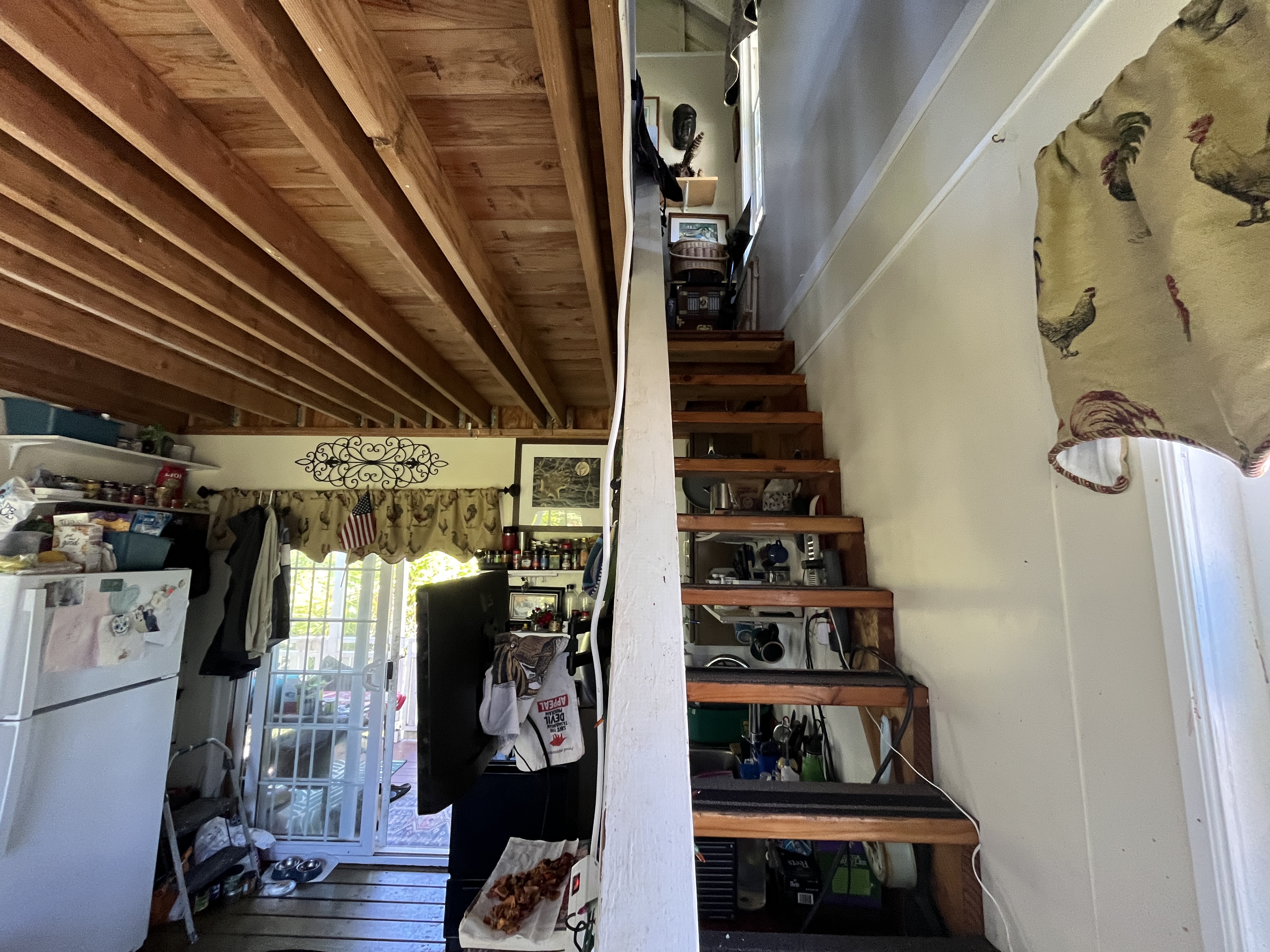 11-2729 Uakoko Road Mountain View, HI 96771 - Photo 7 of 26 a view of walk in closet with clothes and shoes