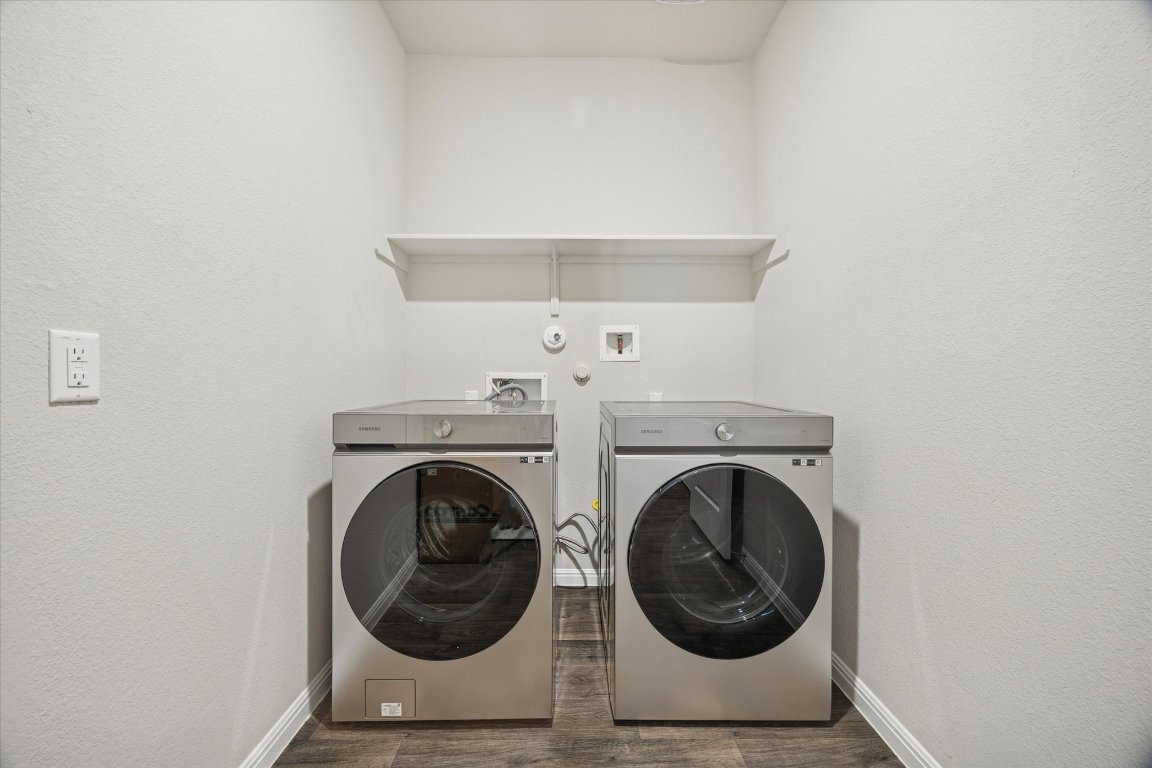 724 Aster Place Bastrop, TX 78602 - Photo 15 of 16 a utility room with dryer and washer
