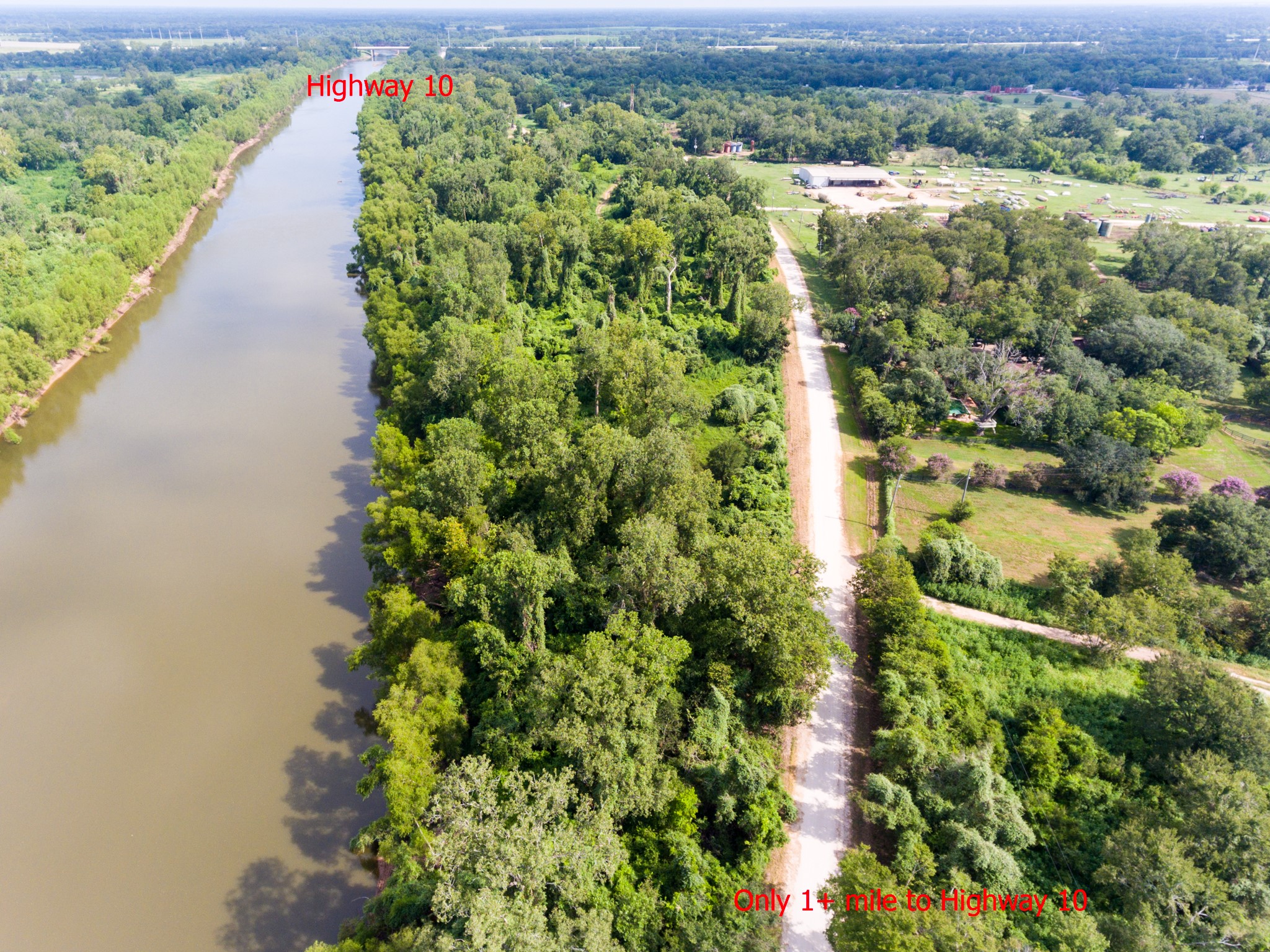 1353 Seidel Road Brookshire, TX 77423 - Photo 31 of 35 an aerial view of residential houses with outdoor space and trees