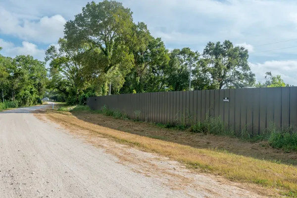 a view of a lake with a big yard