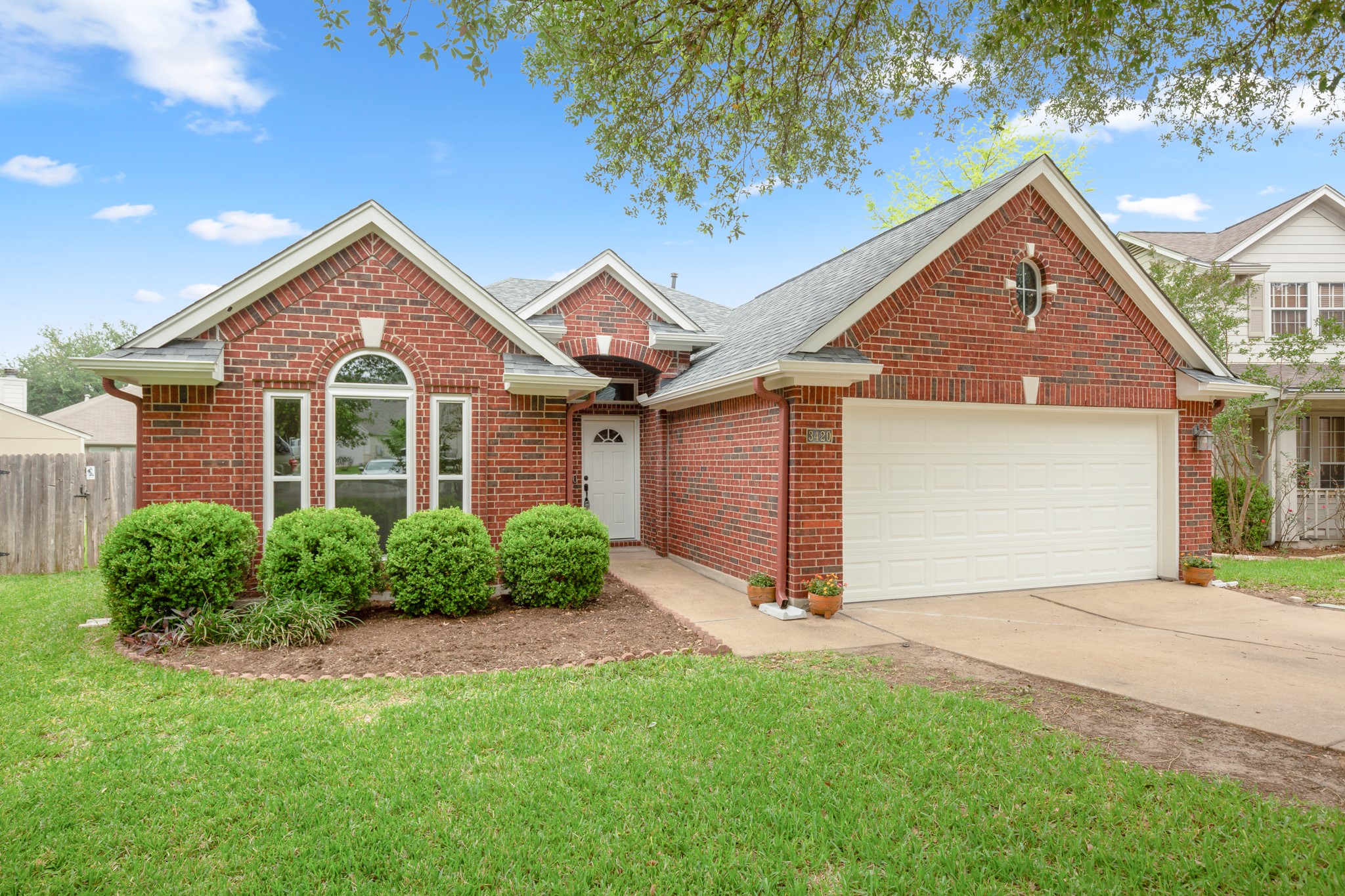 3420 Ribbon Reef Lane Austin, TX 78728 - Photo 2 of 25 Home has wood tile flooring and recent carpet, full sprinkler system and a list of other updates