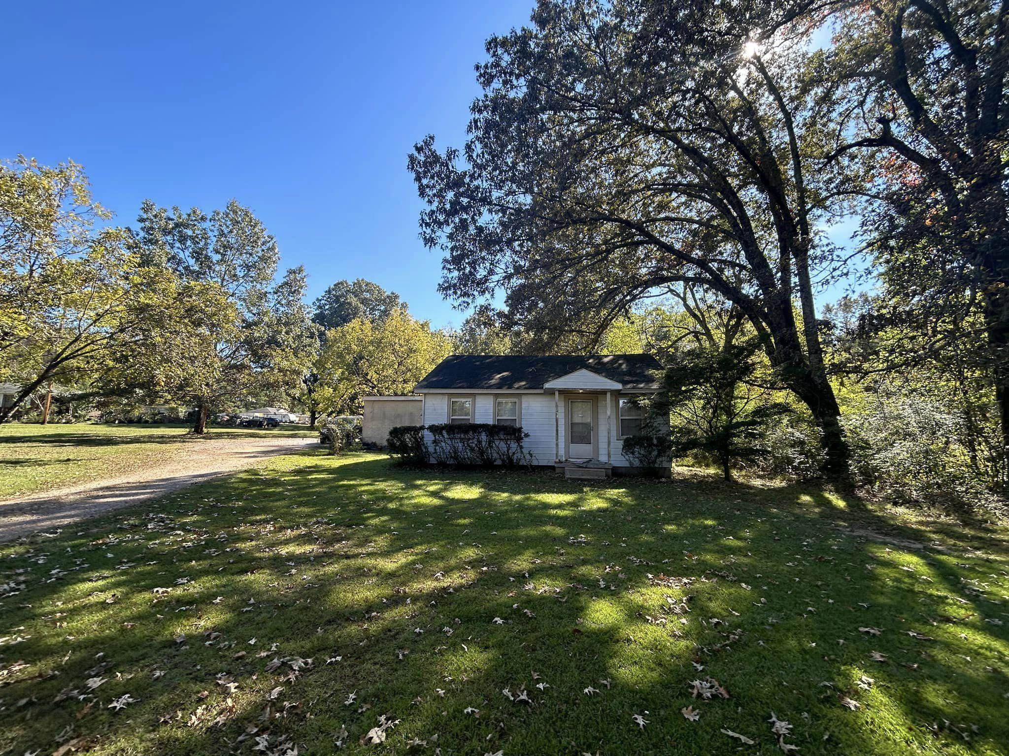 11361 Macon Road Eads, TN 38028 - Photo 1 of 14 a view of a house with a big yard and large trees