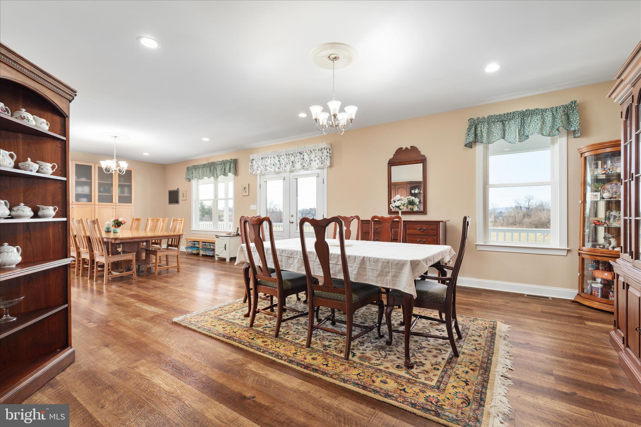 199 Laurel Grove Road Winchester, VA 22602 - Photo 12 of 97 a view of a dining room with furniture and wooden floor