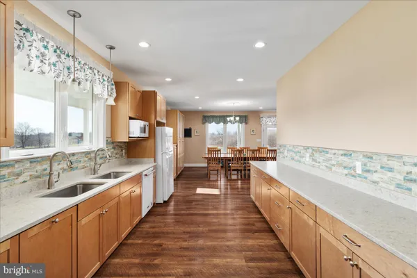 a view of a kitchen with storage and utility